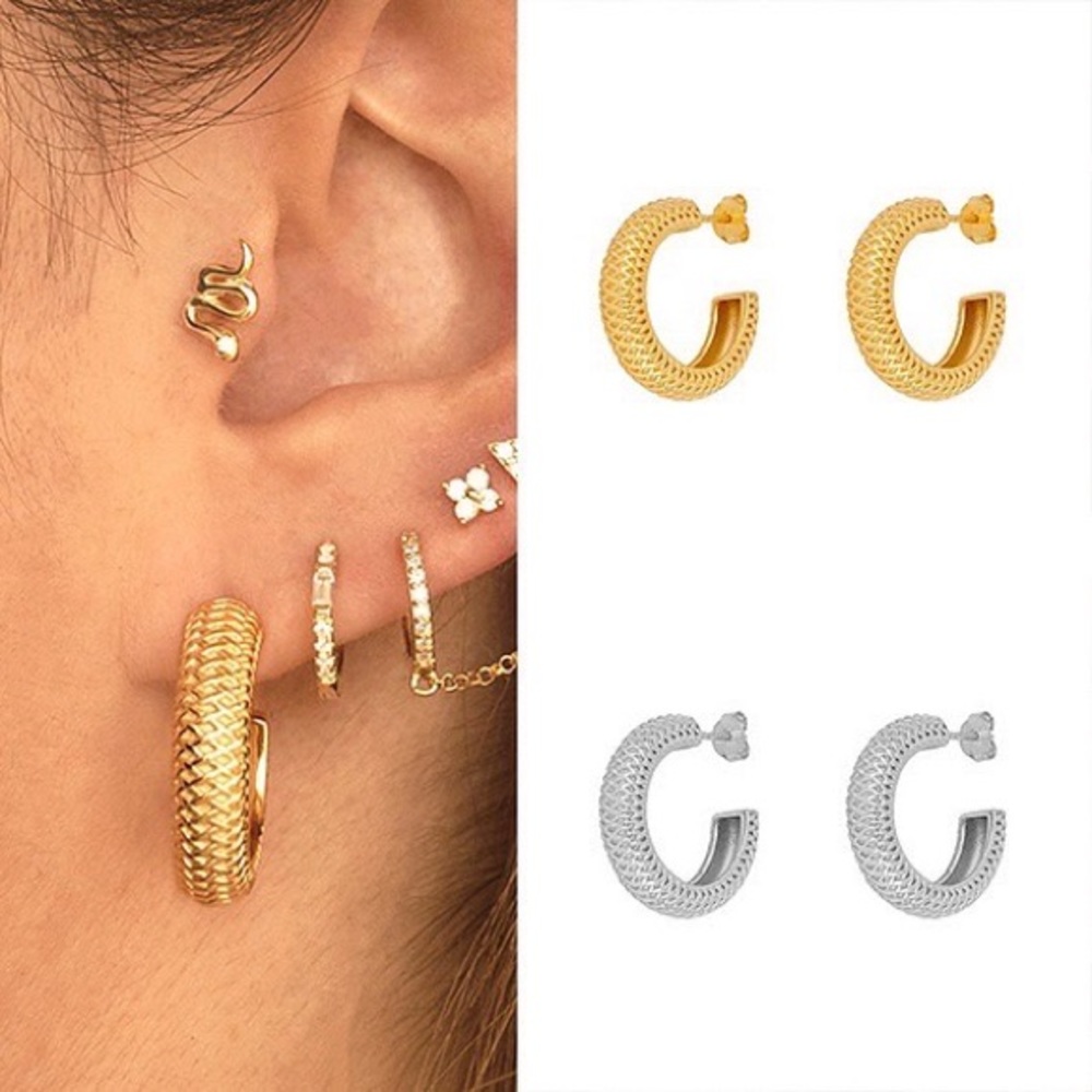 Gold and silver plated c-shaped earrings.